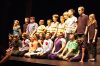 A group of children on a stage